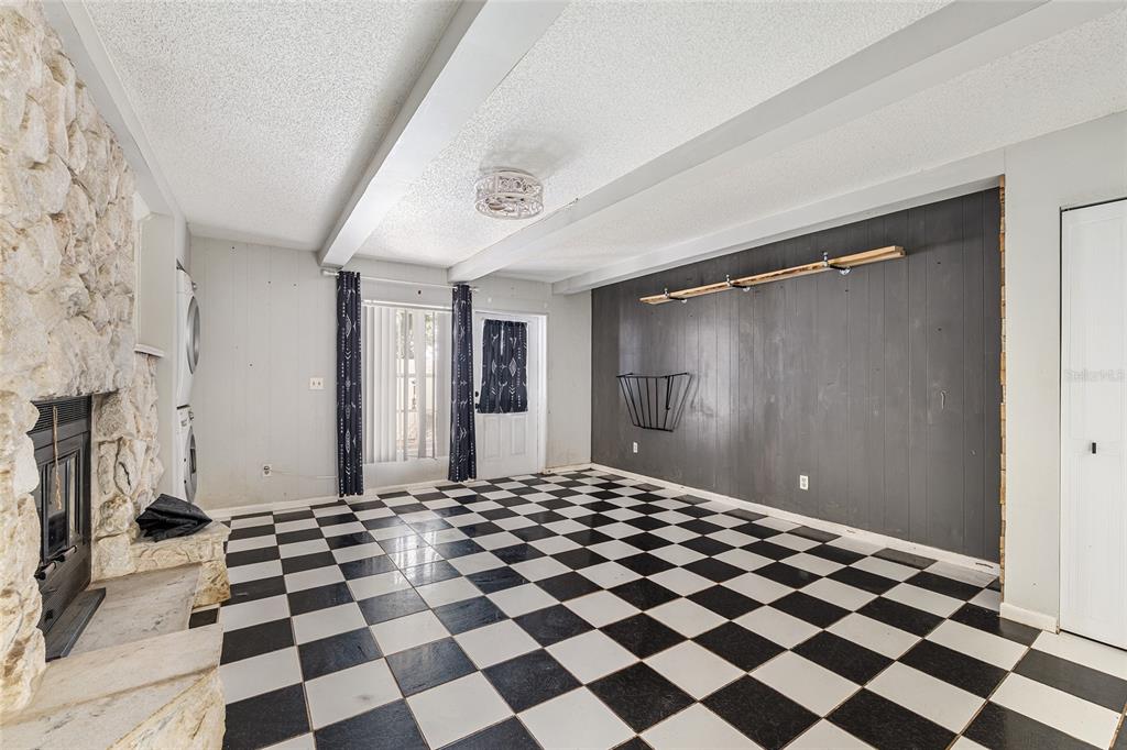 9951 Southwest 88th Court Road, Unit C Ocala, FL 34481 - Photo 13 of 46 a black and white checkered floor