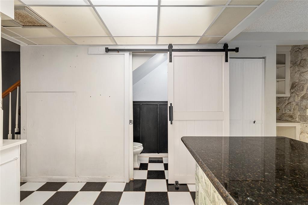 9951 Southwest 88th Court Road, Unit C Ocala, FL 34481 - Photo 18 of 46 a view of a storage & utility room with a sink