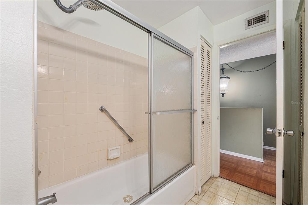 9951 Southwest 88th Court Road, Unit C Ocala, FL 34481 - Photo 34 of 46 a bathroom with a shower and a sink