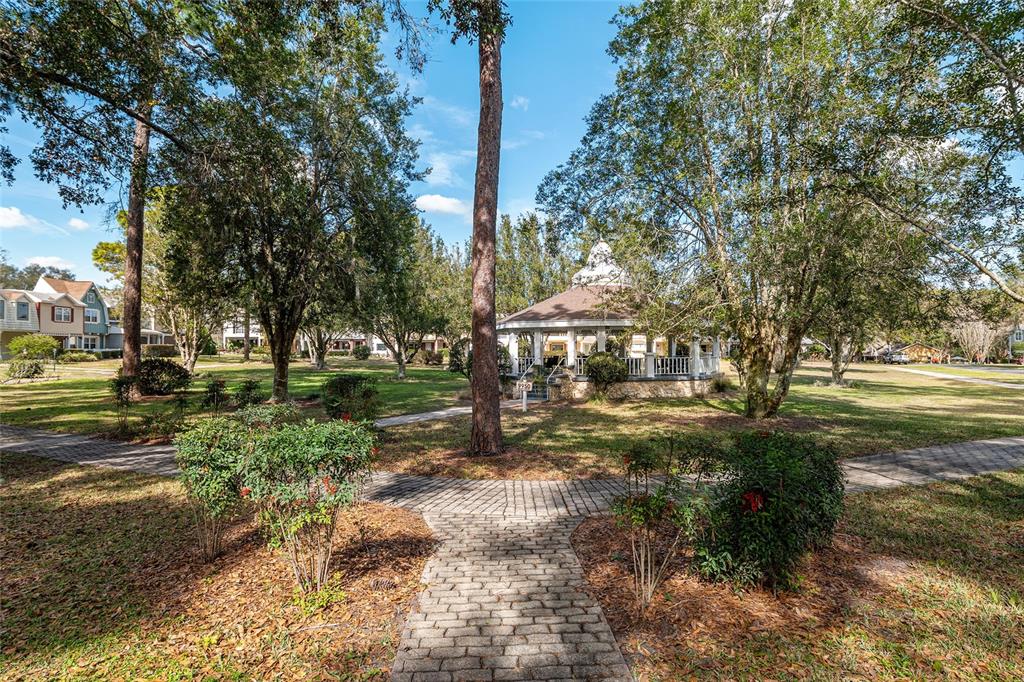 9951 Southwest 88th Court Road, Unit C Ocala, FL 34481 - Photo 45 of 46 a view of yard with tree