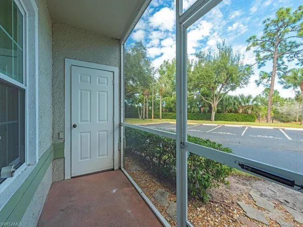 a view of a porch with a yard