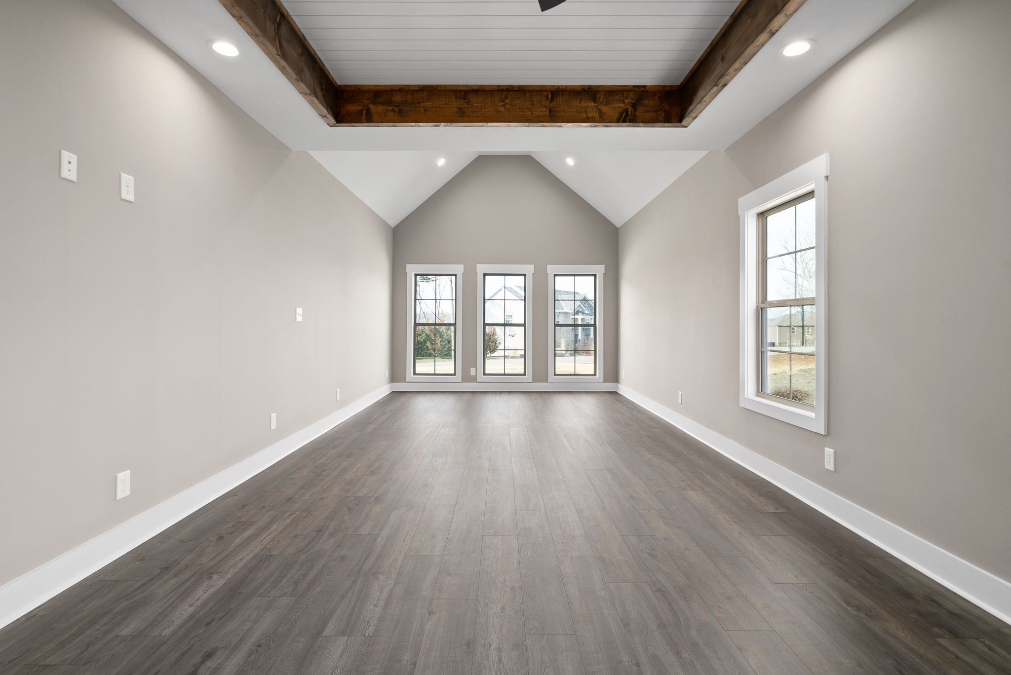 1059 Gratton Road Clarksville, TN 37043 - Photo 22 of 45 an empty room with wooden floor and windows