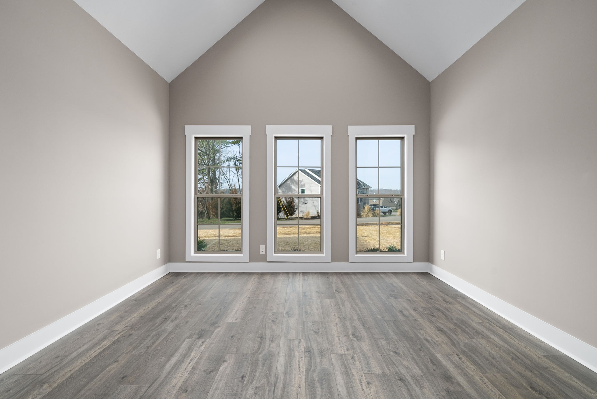 1059 Gratton Road Clarksville, TN 37043 - Photo 23 of 45 an empty room with wooden floor and windows