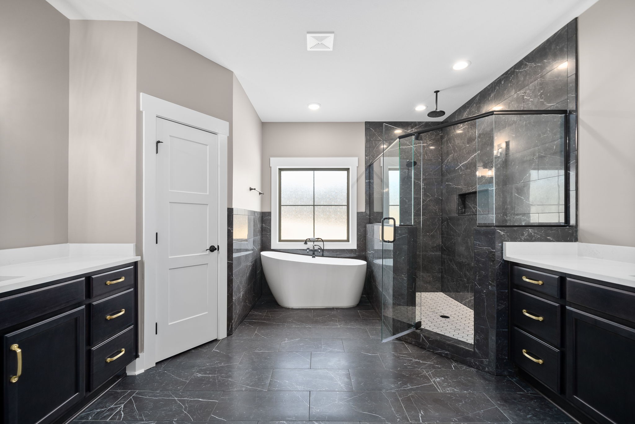 1059 Gratton Road Clarksville, TN 37043 - Photo 27 of 45 a bathroom with a double vanity sink a large mirror and shower
