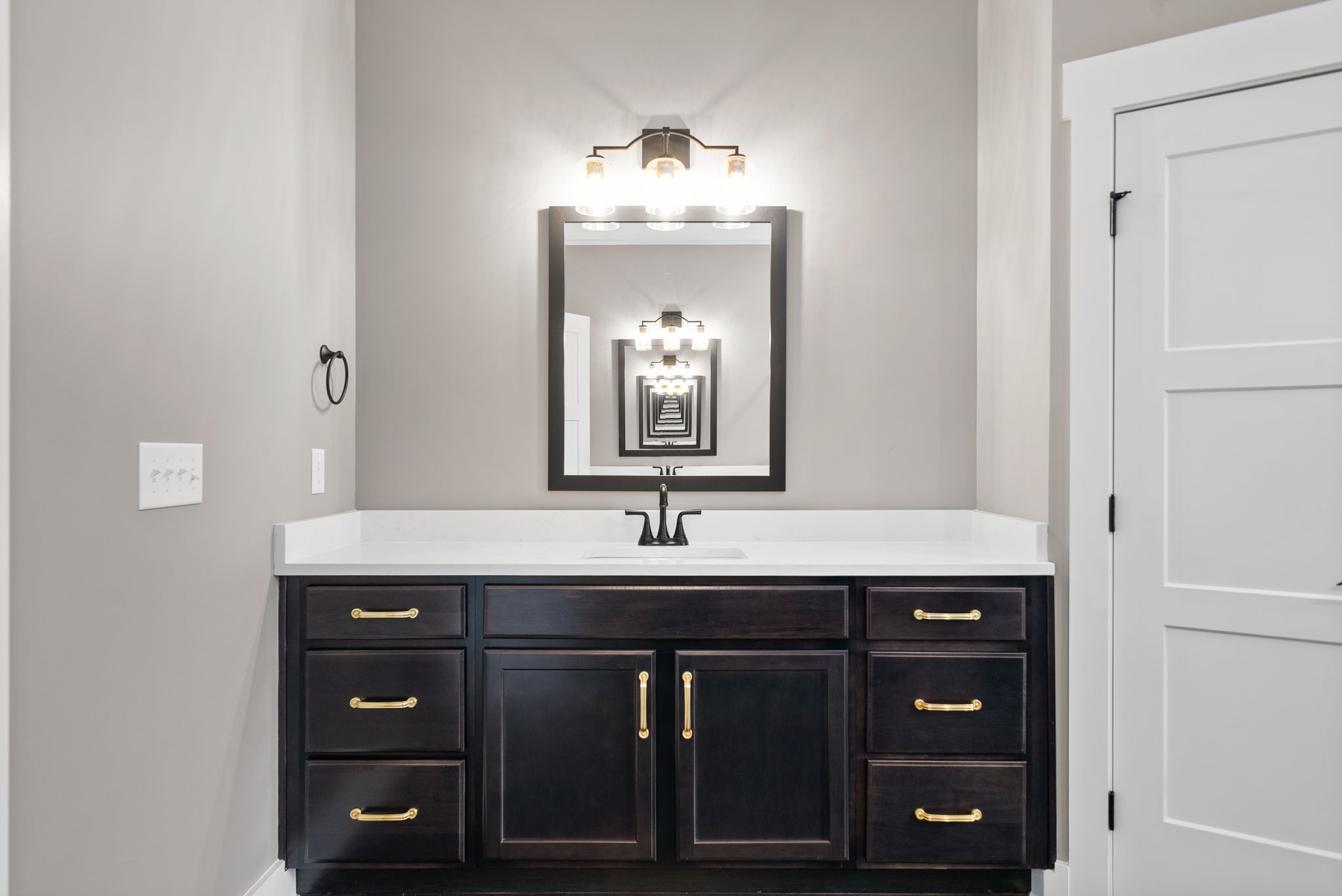 1059 Gratton Road Clarksville, TN 37043 - Photo 28 of 45 a bathroom with a granite countertop sink and a mirror
