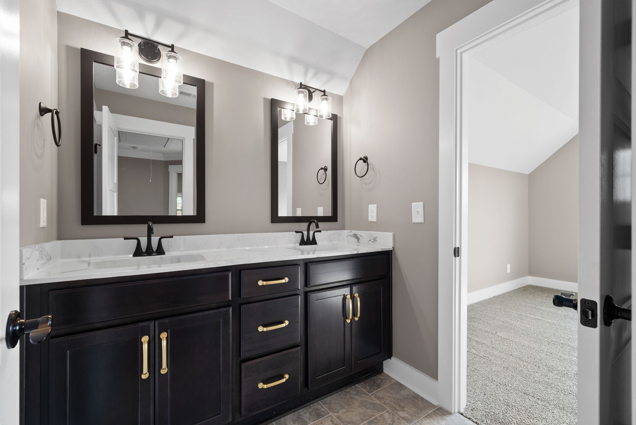 1059 Gratton Road Clarksville, TN 37043 - Photo 33 of 45 a bathroom with a double vanity sink and mirror