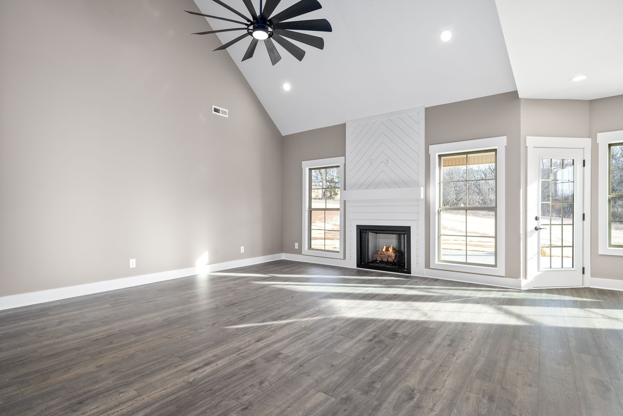 1059 Gratton Road Clarksville, TN 37043 - Photo 6 of 45 a view of an empty room with window and fire place