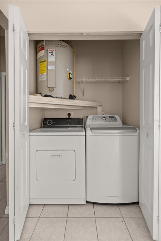 9680 Southwest 30th Terrace Ocala, FL 34476 - Photo 11 of 27 a utility room with dryer and washer