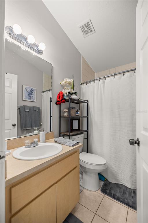 9680 Southwest 30th Terrace Ocala, FL 34476 - Photo 19 of 27 a bathroom with a sink toilet and a mirror