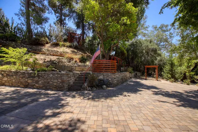 a view of a pathway of a building from a balcony