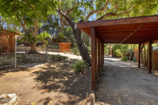 a view of balcony with wooden floor and outdoor space