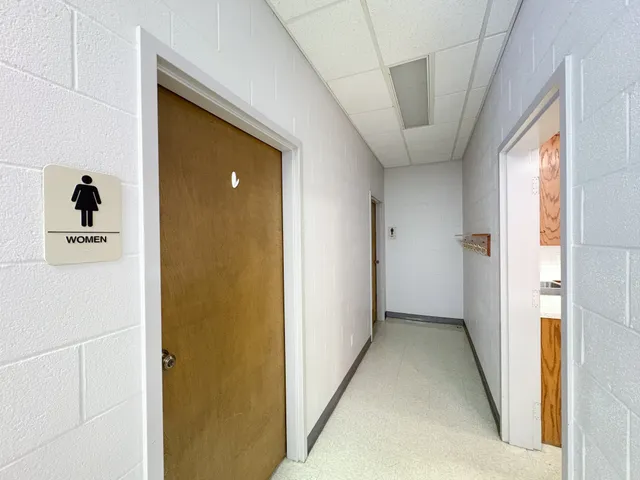 a view of a hallway with closet