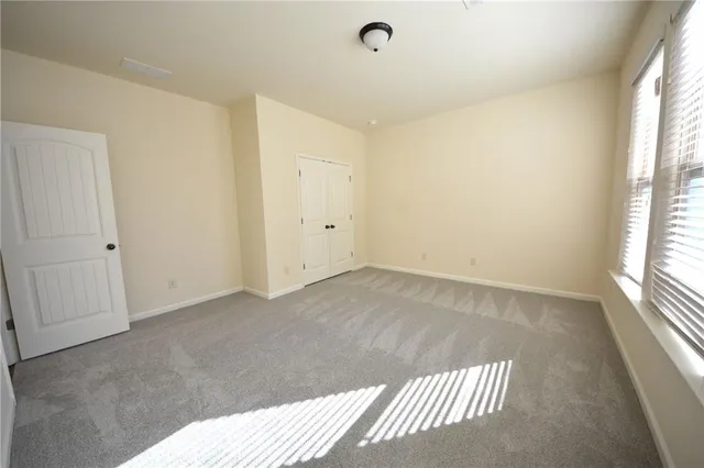 a bathroom with a sink toilet and a mirror