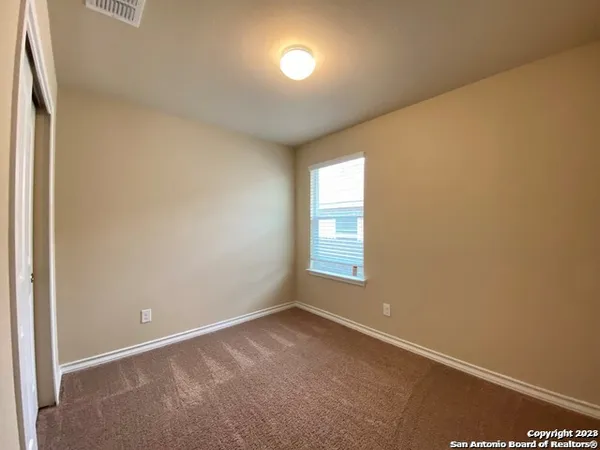 an empty room with a window