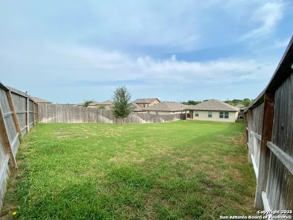 a view of an outdoor space and a yard