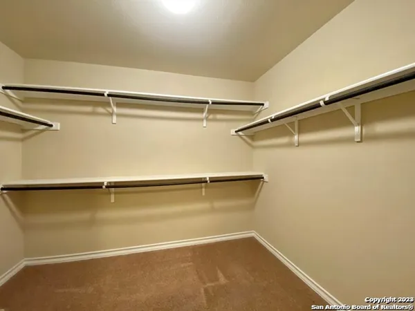 a view of a room with racks on the wall