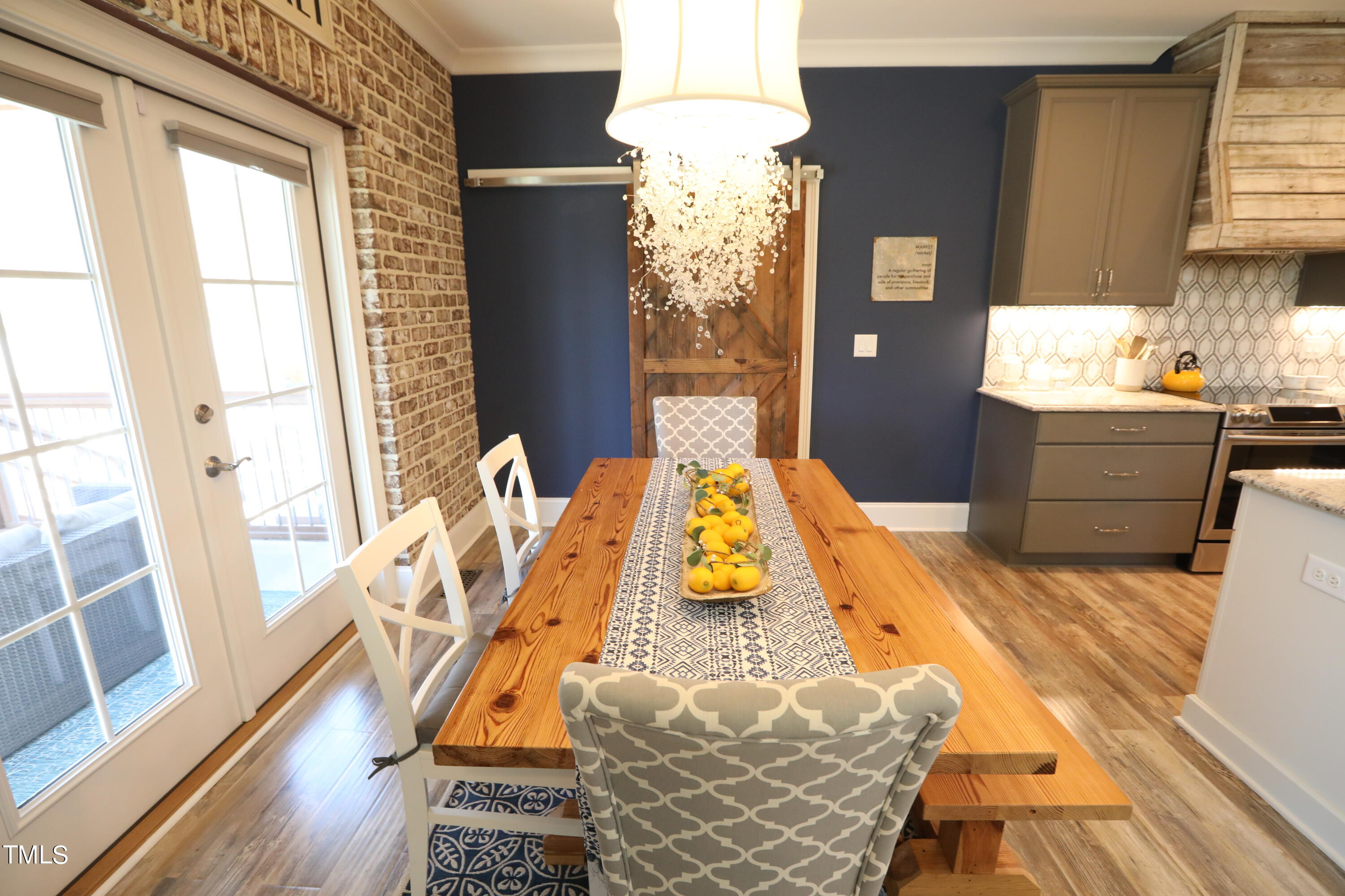 664 Old Fairground Road Willow Spring, NC 27592 - Photo 18 of 40 a bedroom with bed and wooden floor