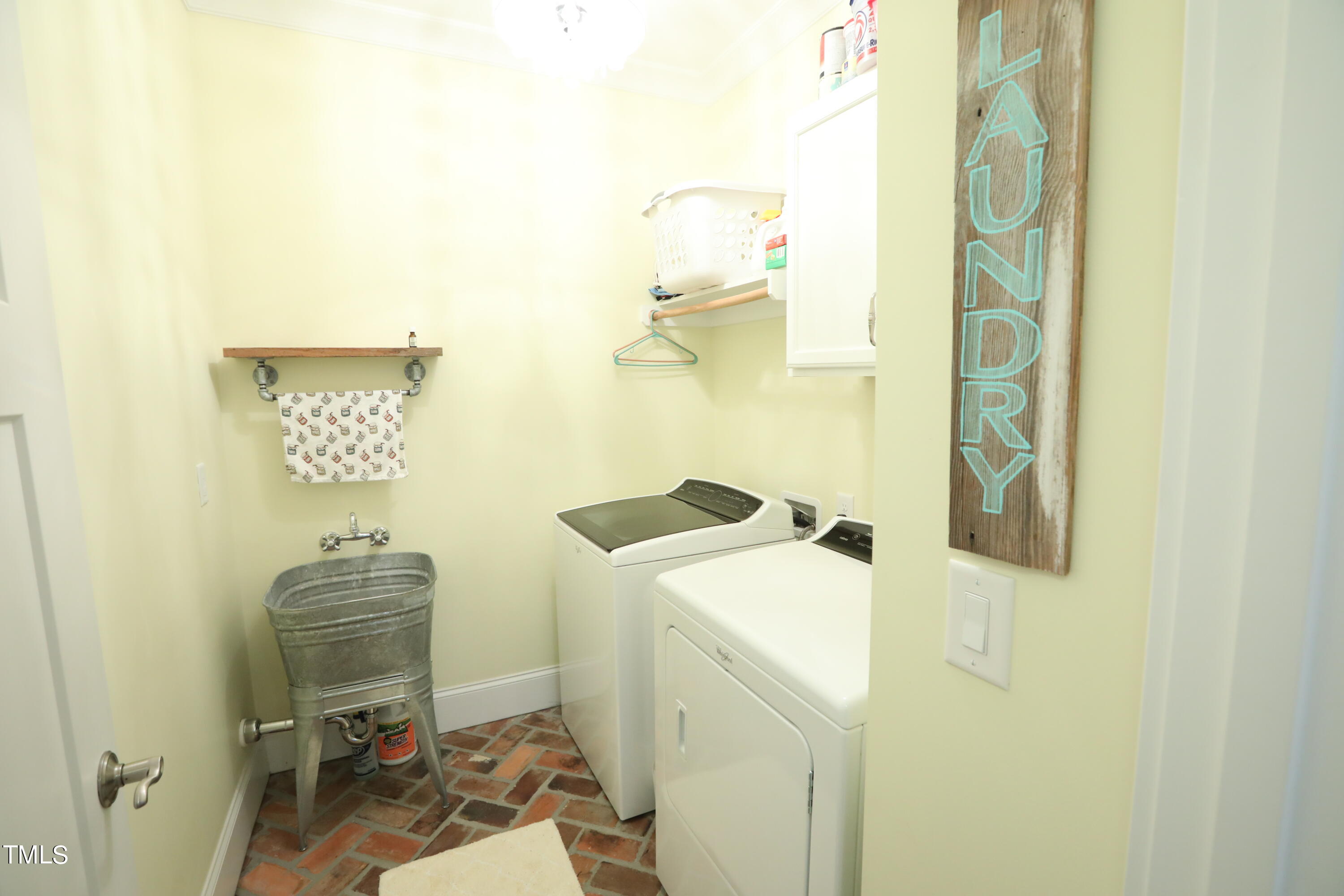 664 Old Fairground Road Willow Spring, NC 27592 - Photo 21 of 40 a bathroom with a sink toilet and shower