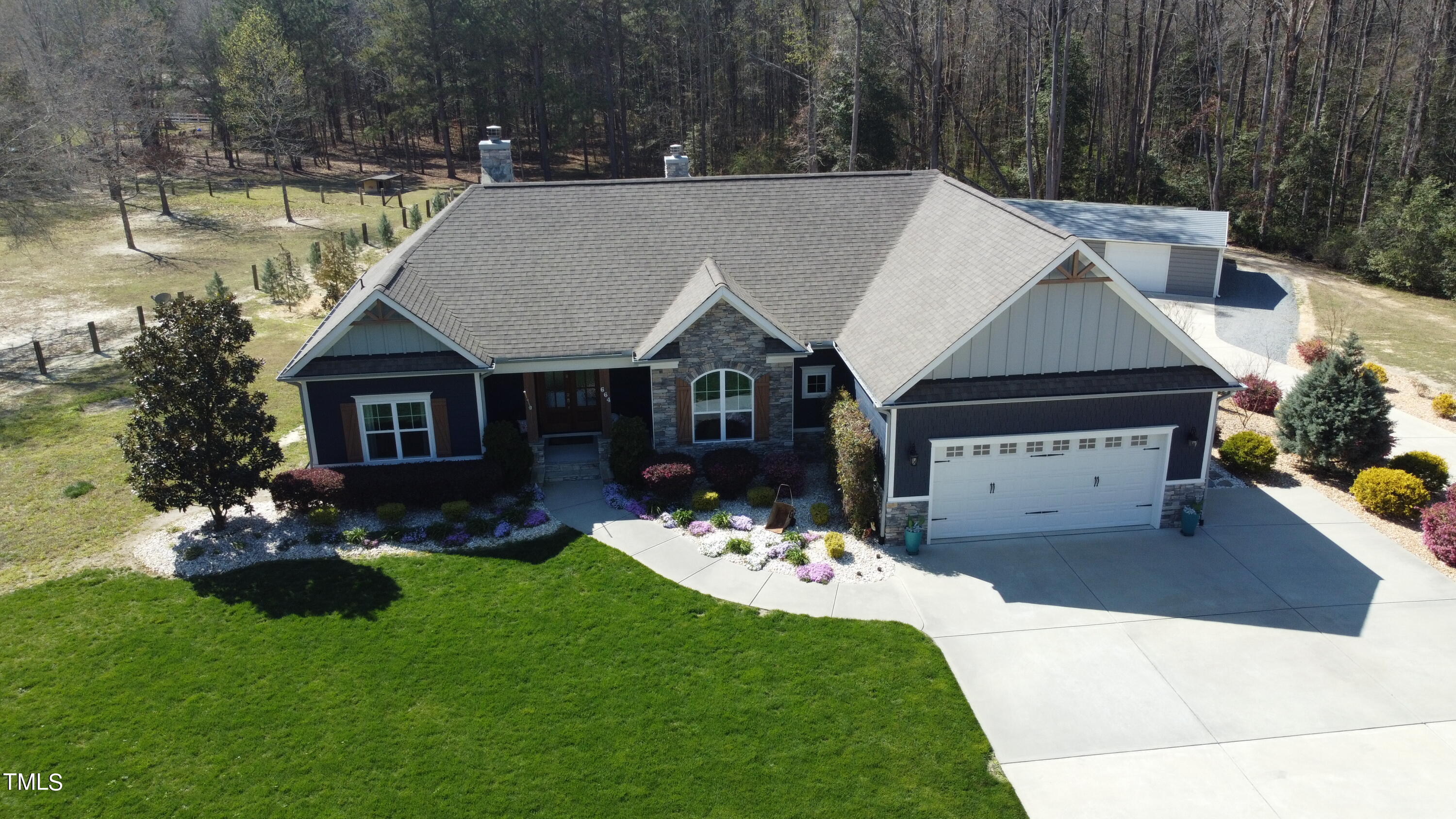 664 Old Fairground Road Willow Spring, NC 27592 - Photo 3 of 40 a aerial view of a house with a yard