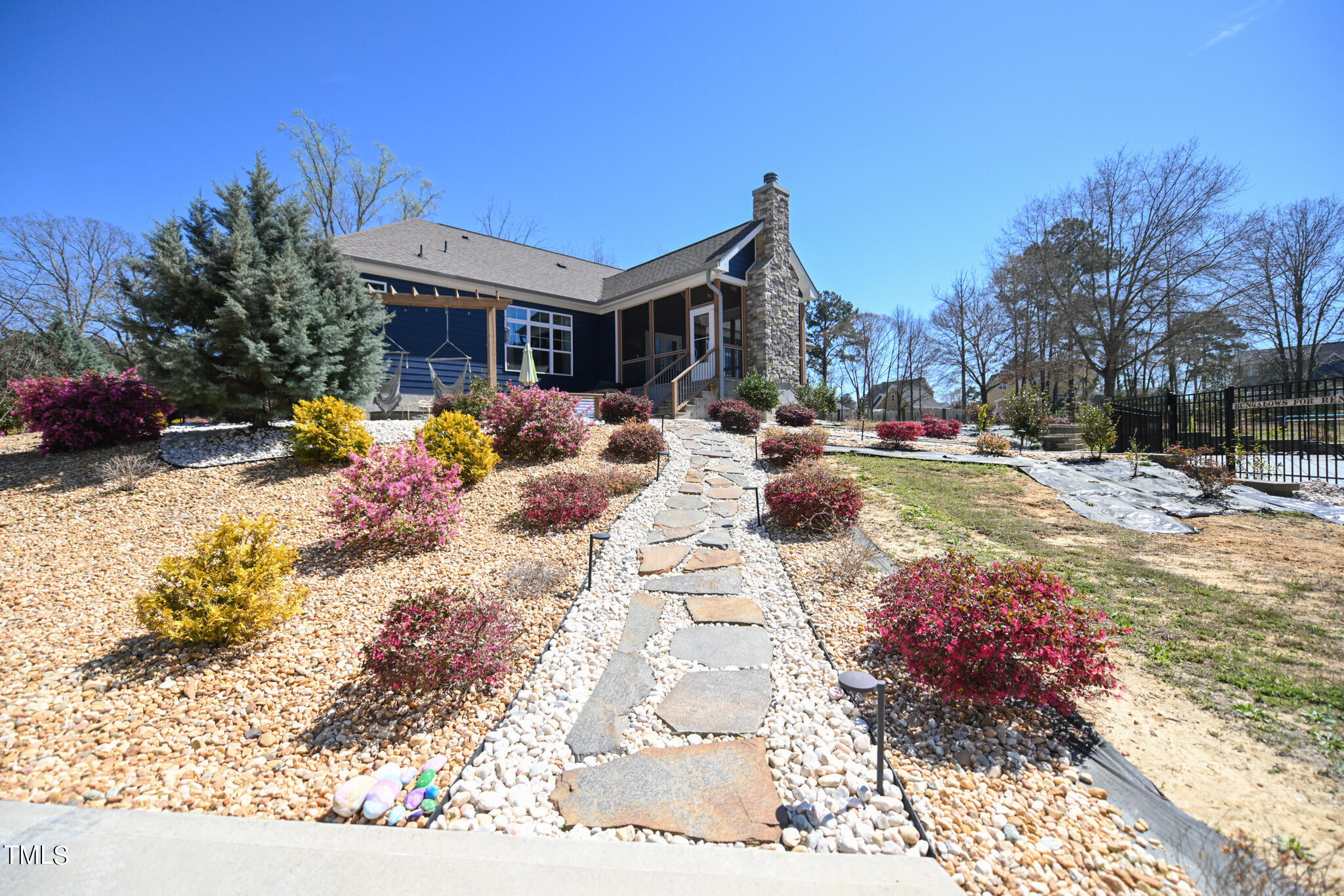 664 Old Fairground Road Willow Spring, NC 27592 - Photo 34 of 40 a view of a house with backyard and sitting area