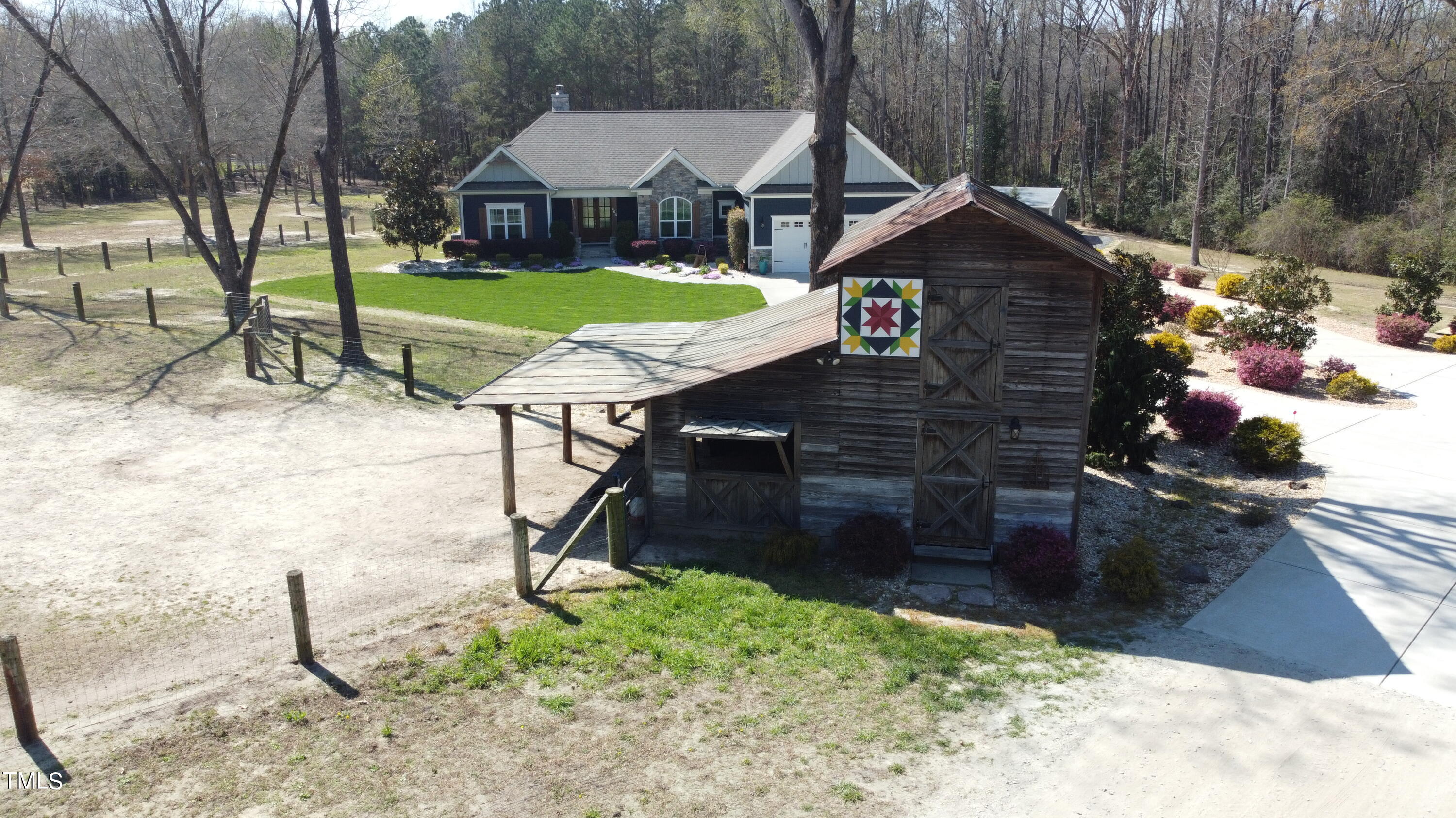 664 Old Fairground Road Willow Spring, NC 27592 - Photo 5 of 40 a front view of a house with garden