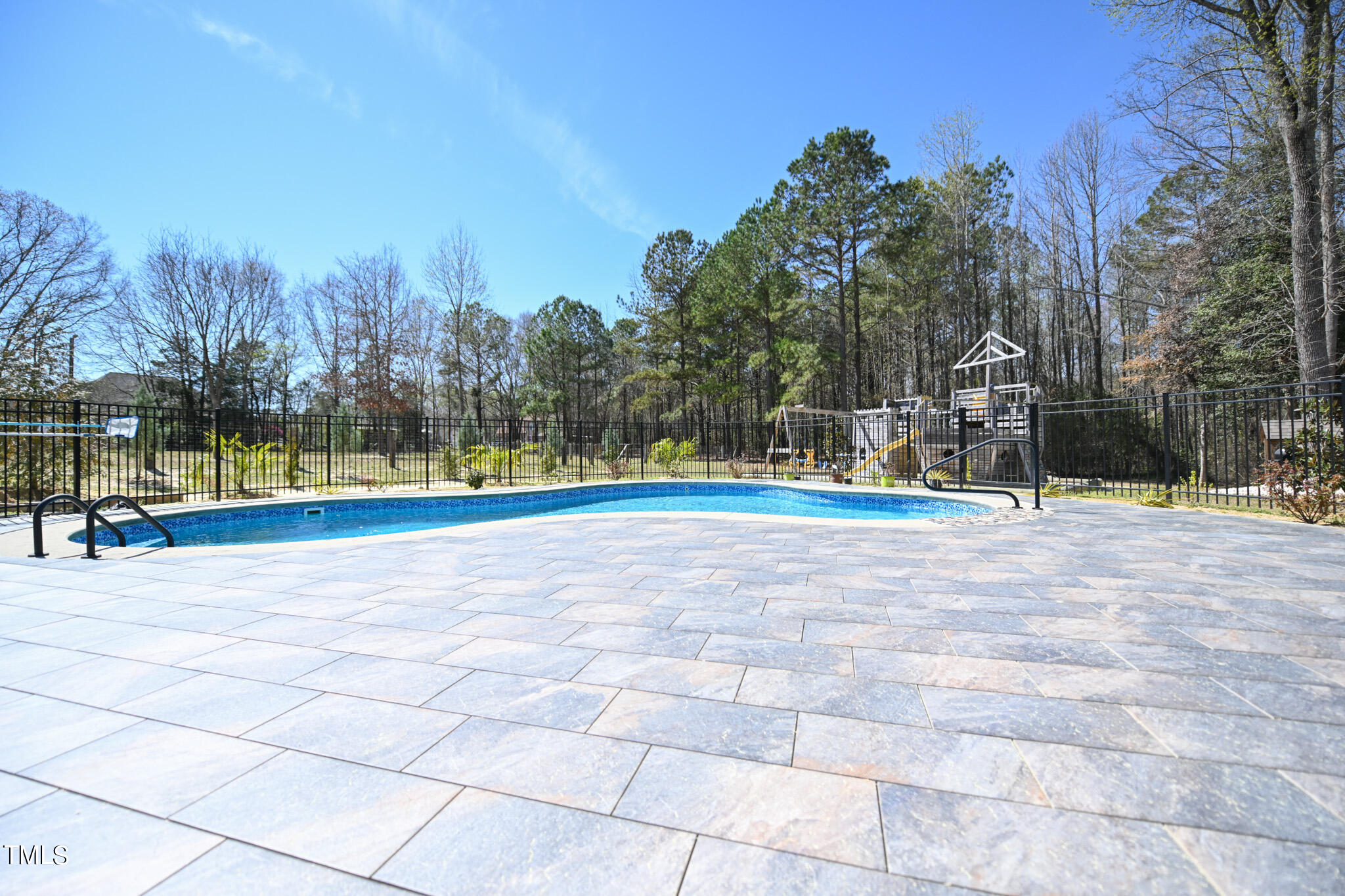 664 Old Fairground Road Willow Spring, NC 27592 - Photo 9 of 40 a view of a playground with basketball court