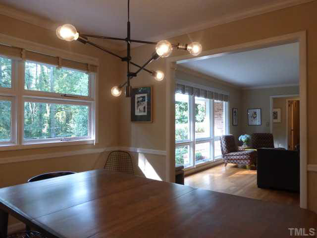 2516 Oxford Road Raleigh, NC 27608 - Photo 5 of 23 The afternoon sun sparkles on the hardwood floors, which are found throughout most of the house including the three bedrooms. This is the view from the Dining Room.
