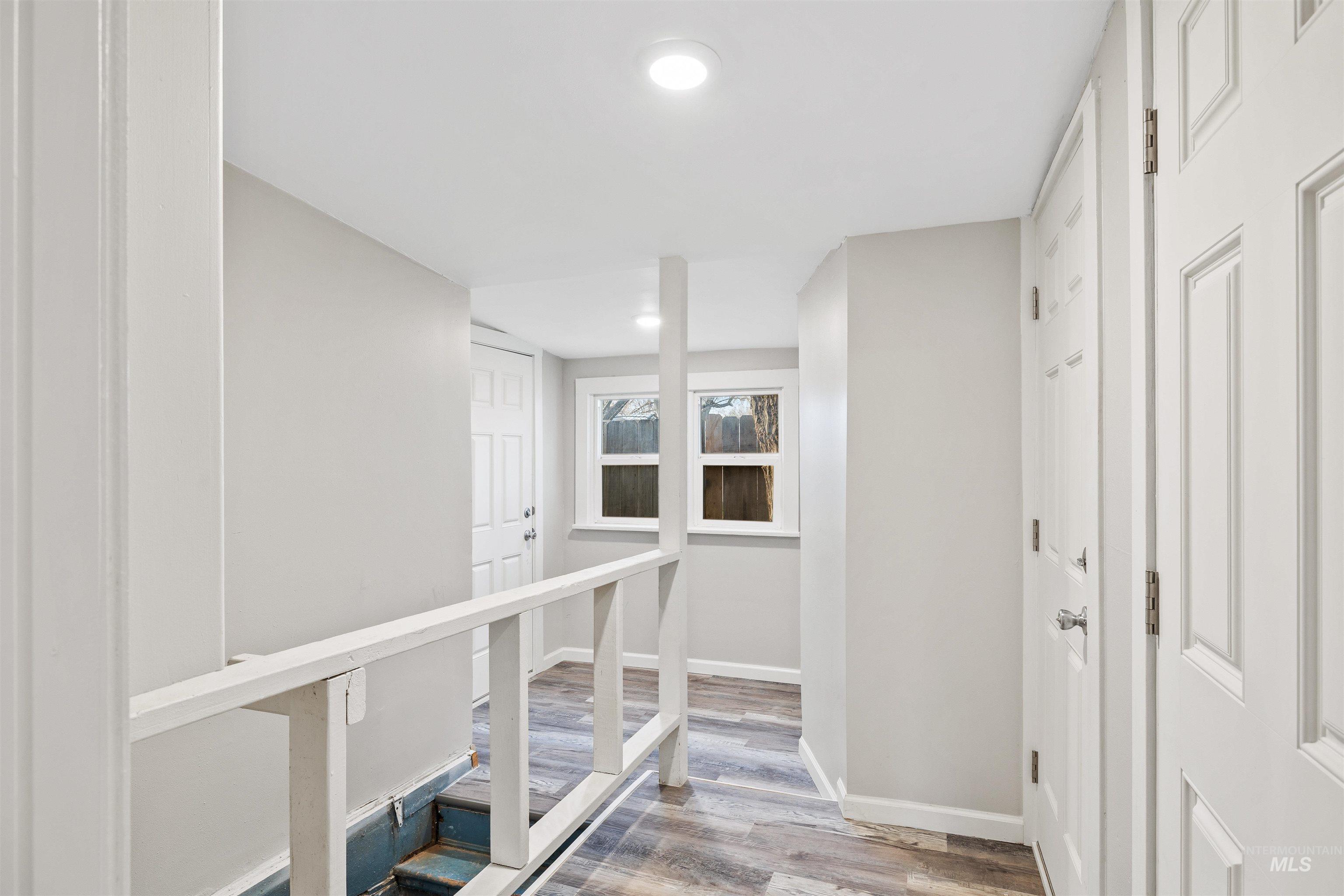 617 Eden Street North Twin Falls, ID 83301 - Photo 17 of 25 Hall featuring light wood-style floors and recessed lighting