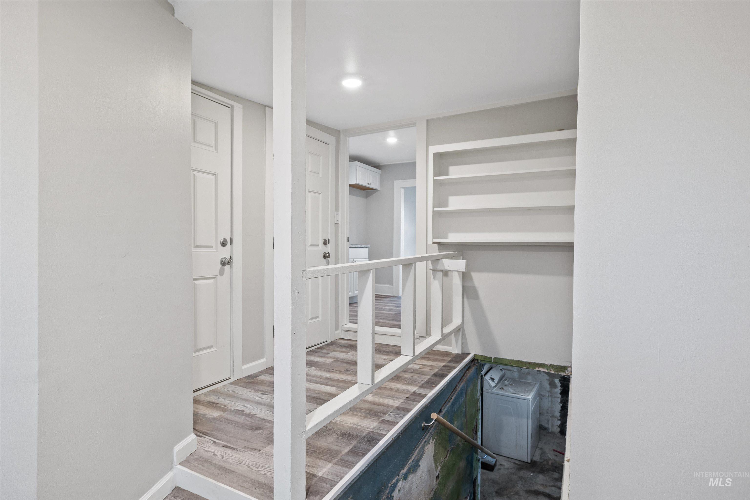617 Eden Street North Twin Falls, ID 83301 - Photo 18 of 25 Corridor featuring wood finished floors