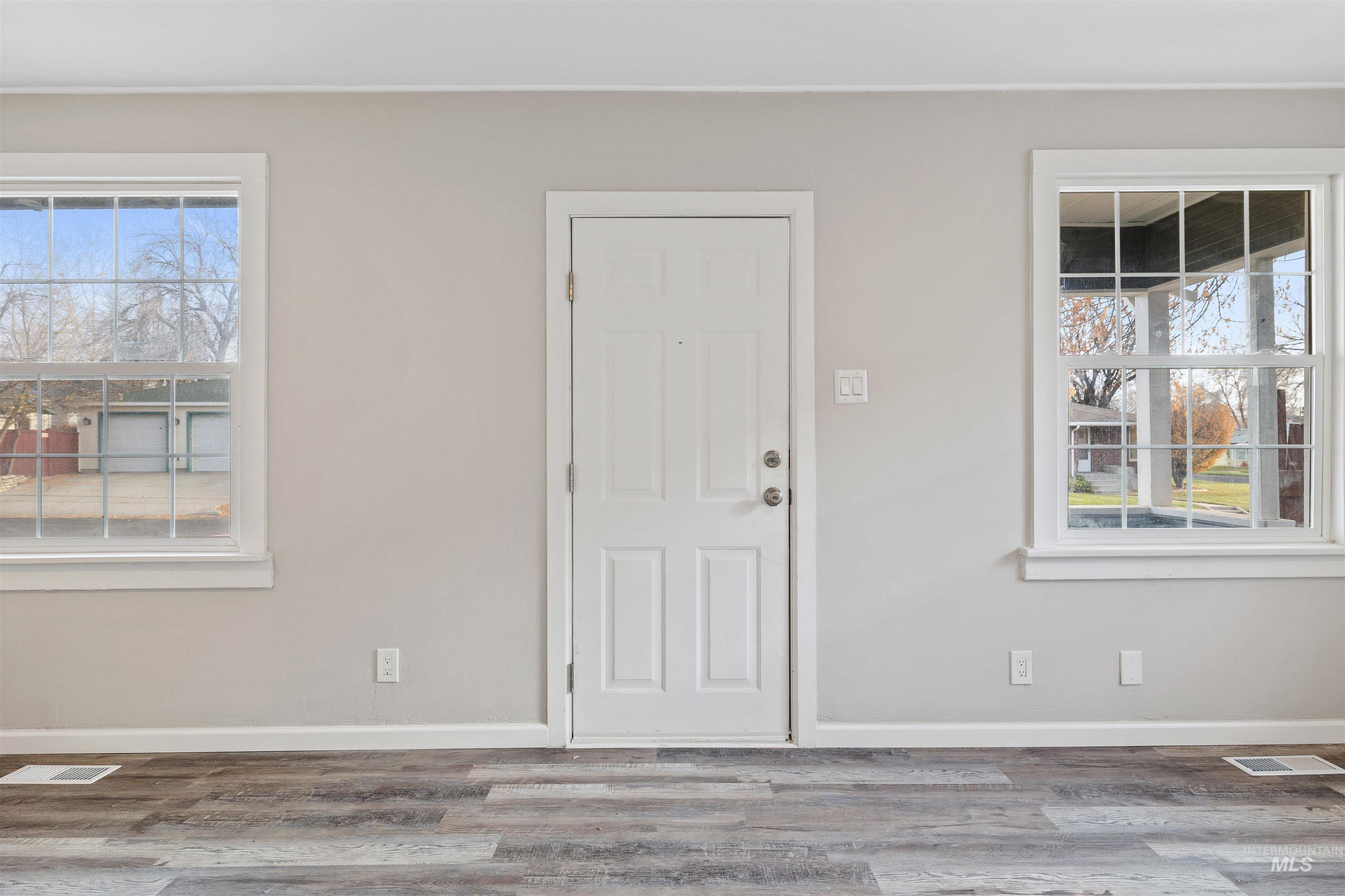 617 Eden Street North Twin Falls, ID 83301 - Photo 4 of 25 Entryway featuring wood finished floors and baseboards