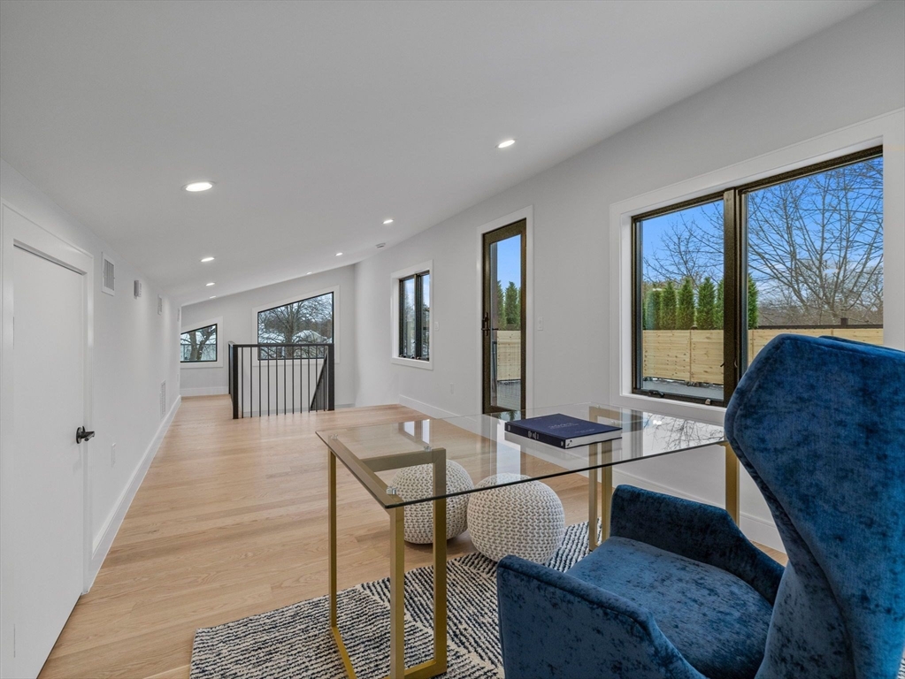 38 Kappius Path Newton, MA 02459 - Photo 12 of 13 a living room with furniture and large window