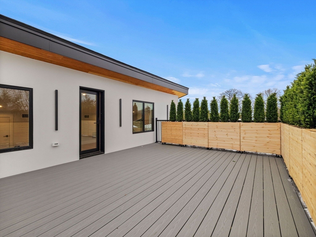 38 Kappius Path Newton, MA 02459 - Photo 13 of 13 a view of front door and deck with wooden floor