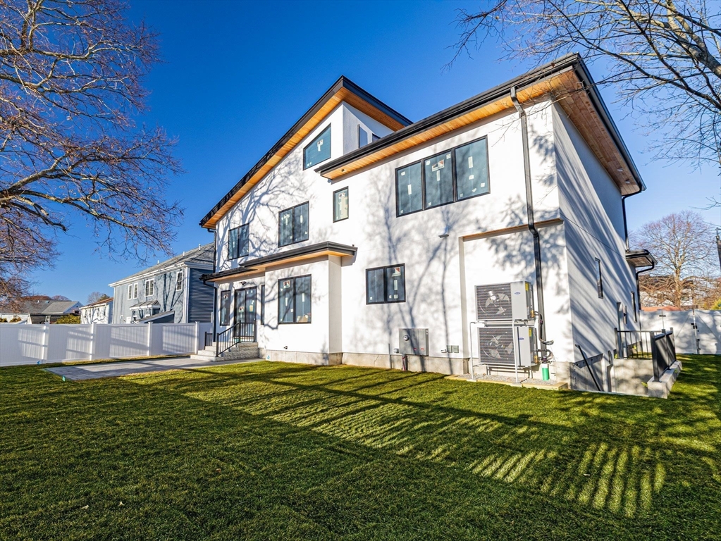 38 Kappius Path Newton, MA 02459 - Photo 2 of 13 a front view of a house with a yard