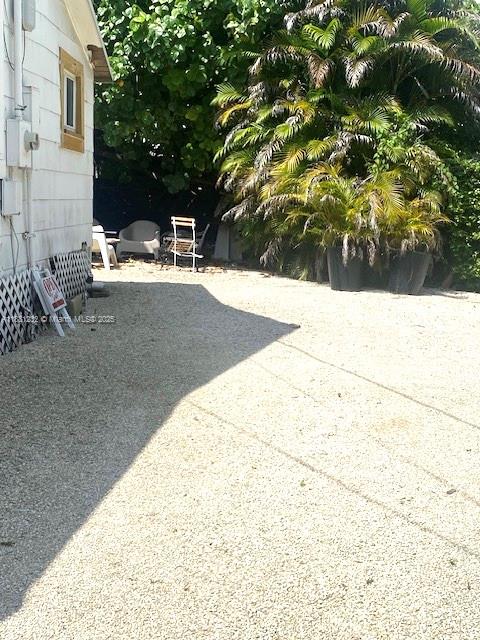 2952 Virginia Street Miami, FL 33133 - Photo 7 of 10 a view of backyard with sitting area