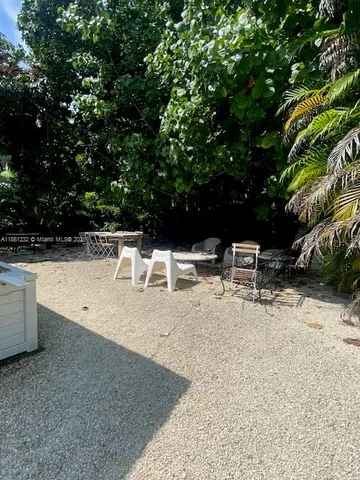 a bathroom with a shower and vanity