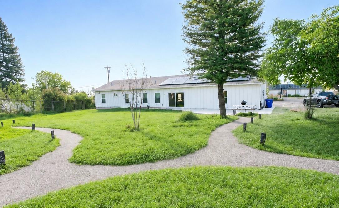 3696 Neal Road Paradise, CA 95969 - Photo 23 of 26 a front view of a house with garden