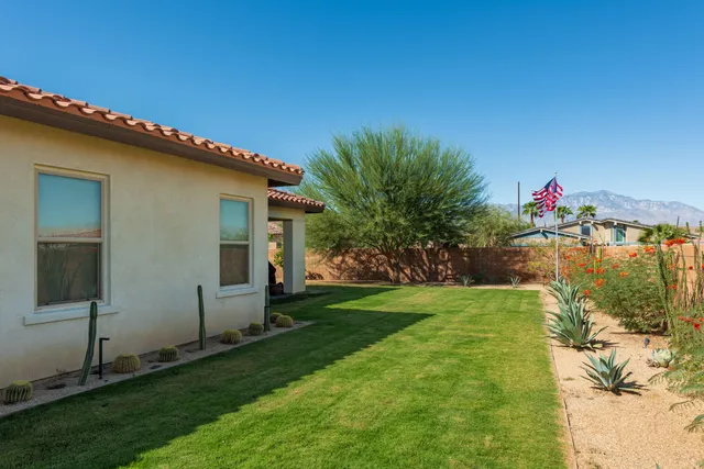 a view of back yard of the house
