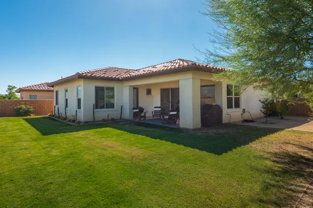 a view of a house with a patio