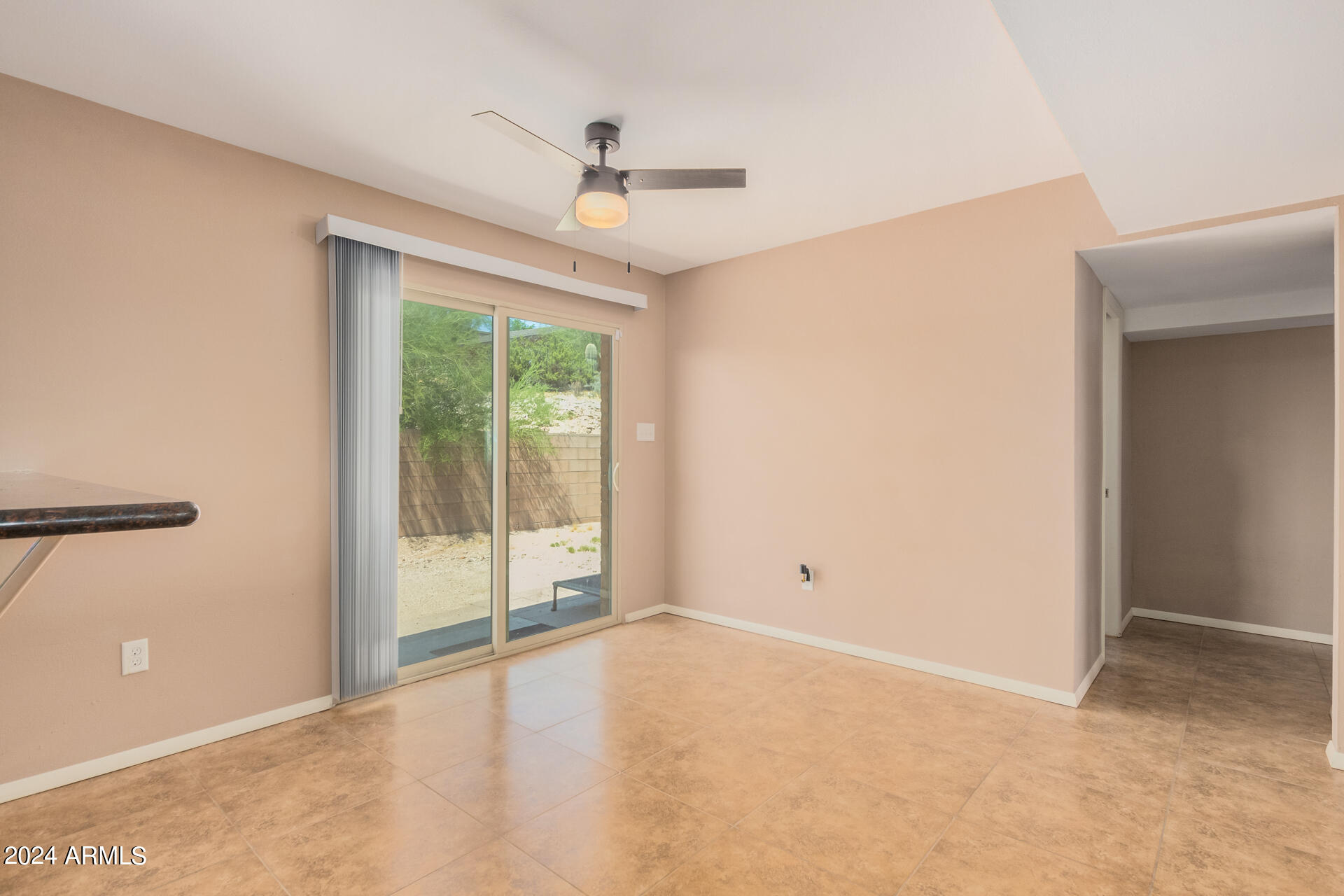 4980 North Hillcrest Drive Tucson, AZ 85704 - Photo 13 of 33 a view of an empty room with glass door
