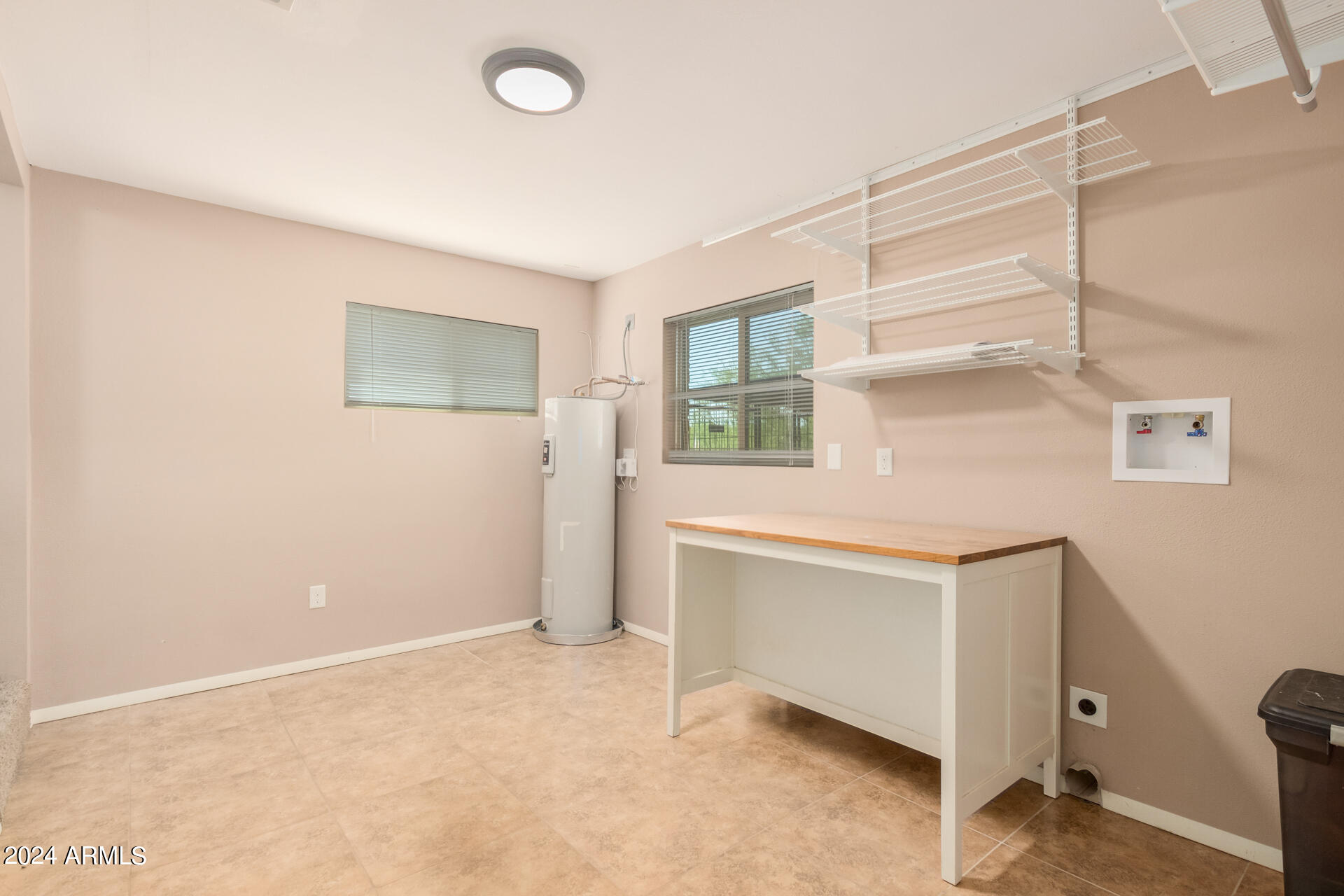 4980 North Hillcrest Drive Tucson, AZ 85704 - Photo 30 of 33 a view of an empty room with a window