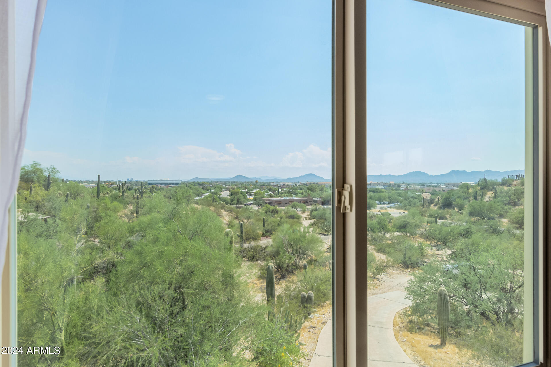 4980 North Hillcrest Drive Tucson, AZ 85704 - Photo 31 of 33 a view of a glass door and a yard