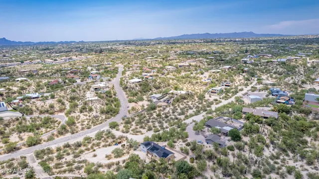 a view of city and green space