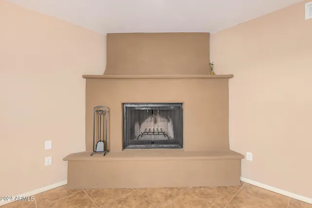 a white building with a fireplace