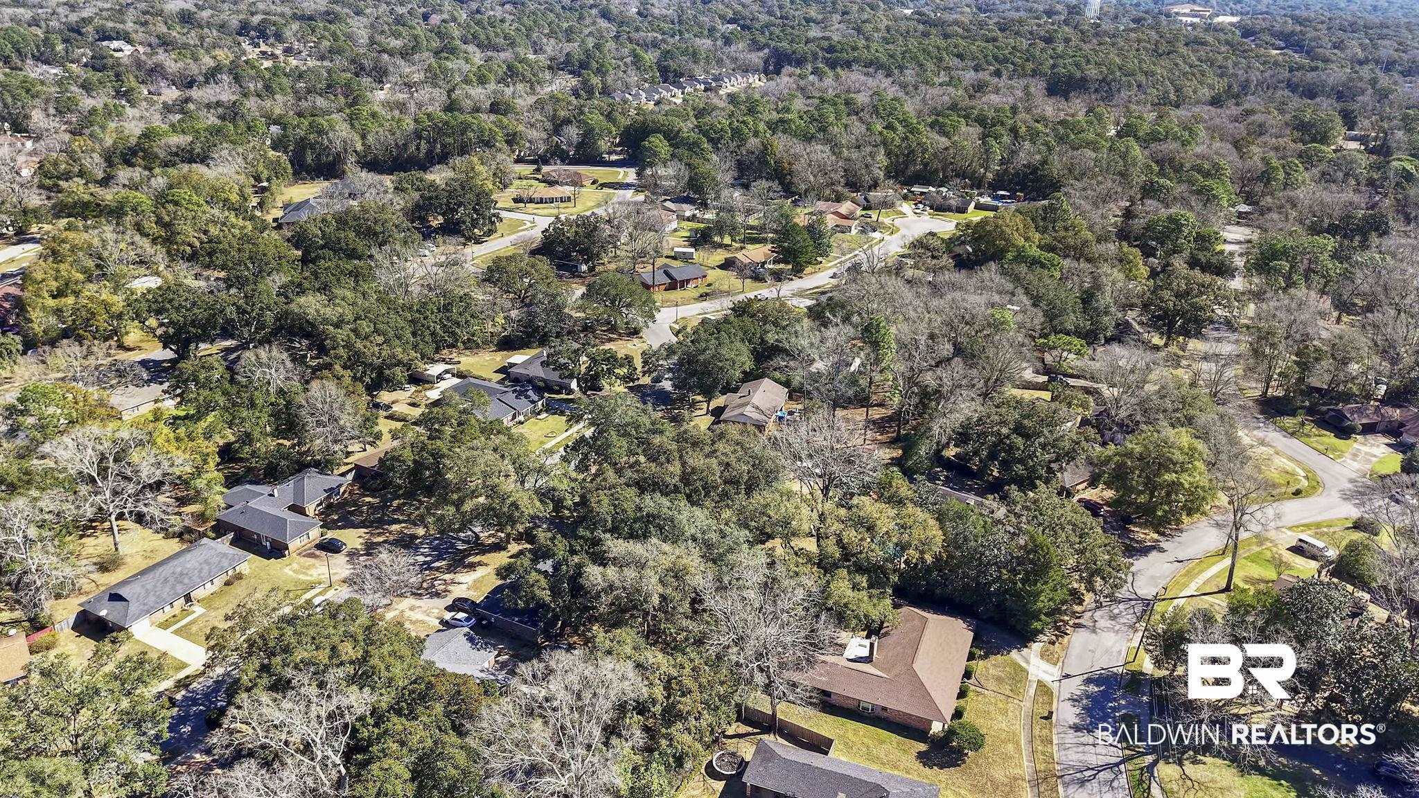 5817 Woodgate Road Mobile, AL 36609 - Photo 77 of 85 Drone / aerial view featuring a view of trees