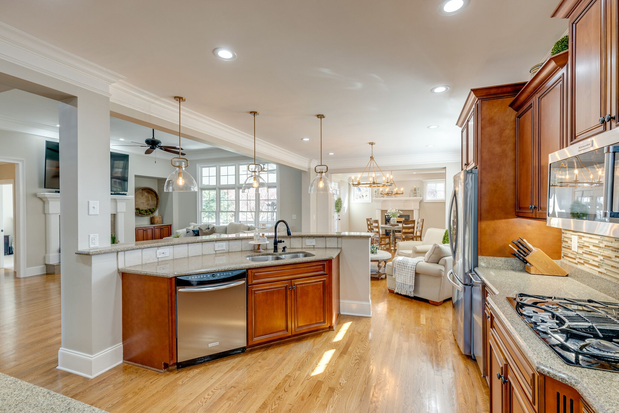 3207 Appian Way Spring Hill, TN 37174 - Photo 17 of 50 a kitchen with stainless steel appliances granite countertop a stove and cabinets