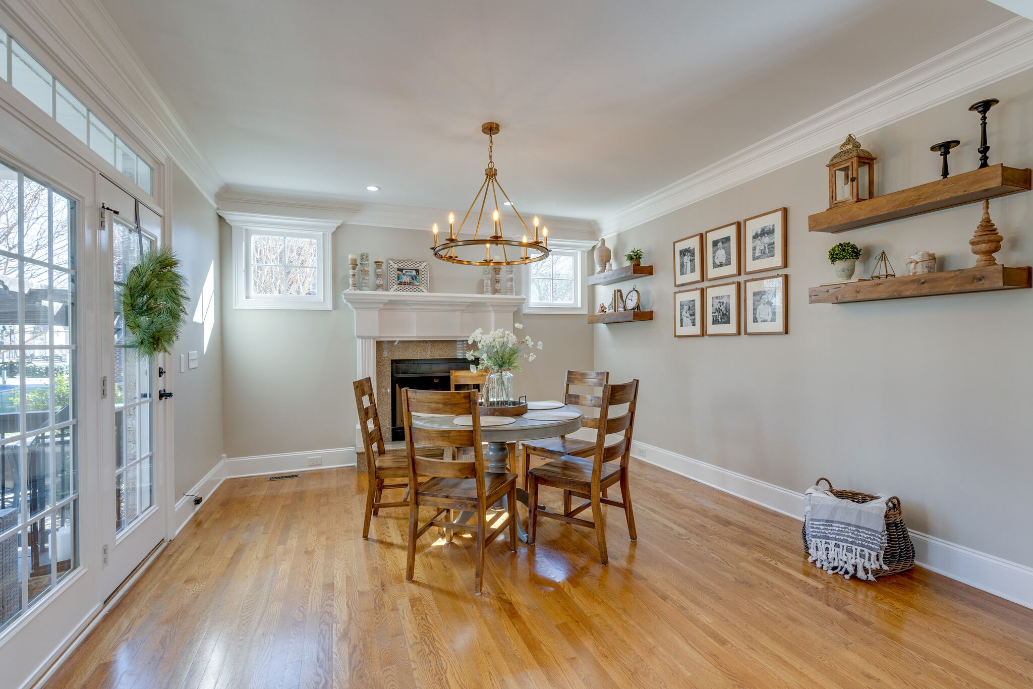 3207 Appian Way Spring Hill, TN 37174 - Photo 21 of 50 a dining room with wooden floor a chandelier a wooden table and chairs