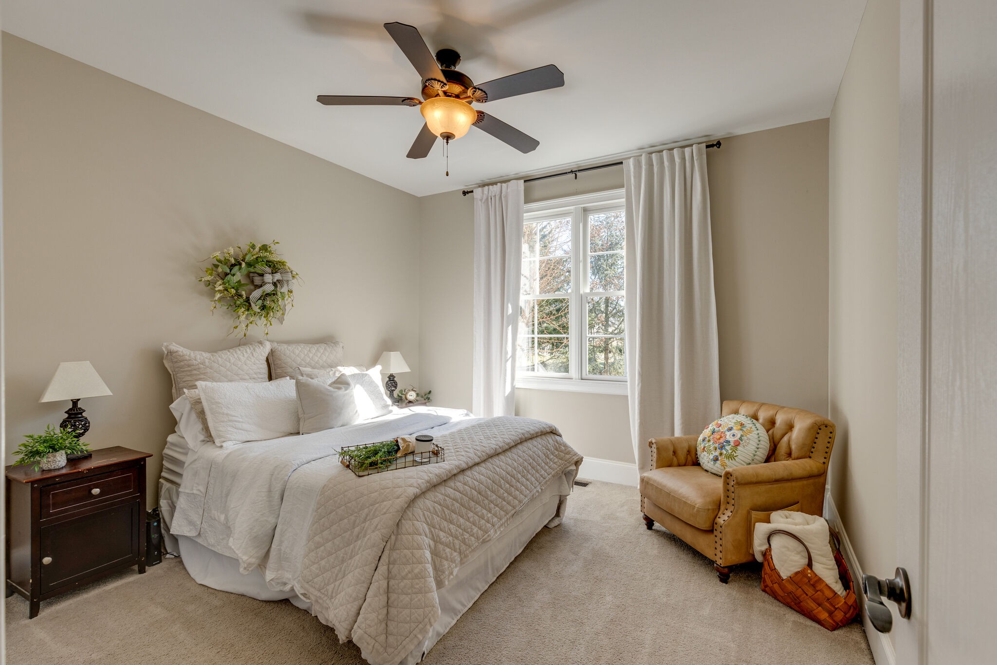 3207 Appian Way Spring Hill, TN 37174 - Photo 25 of 50 a bedroom with a bed and a chandelier