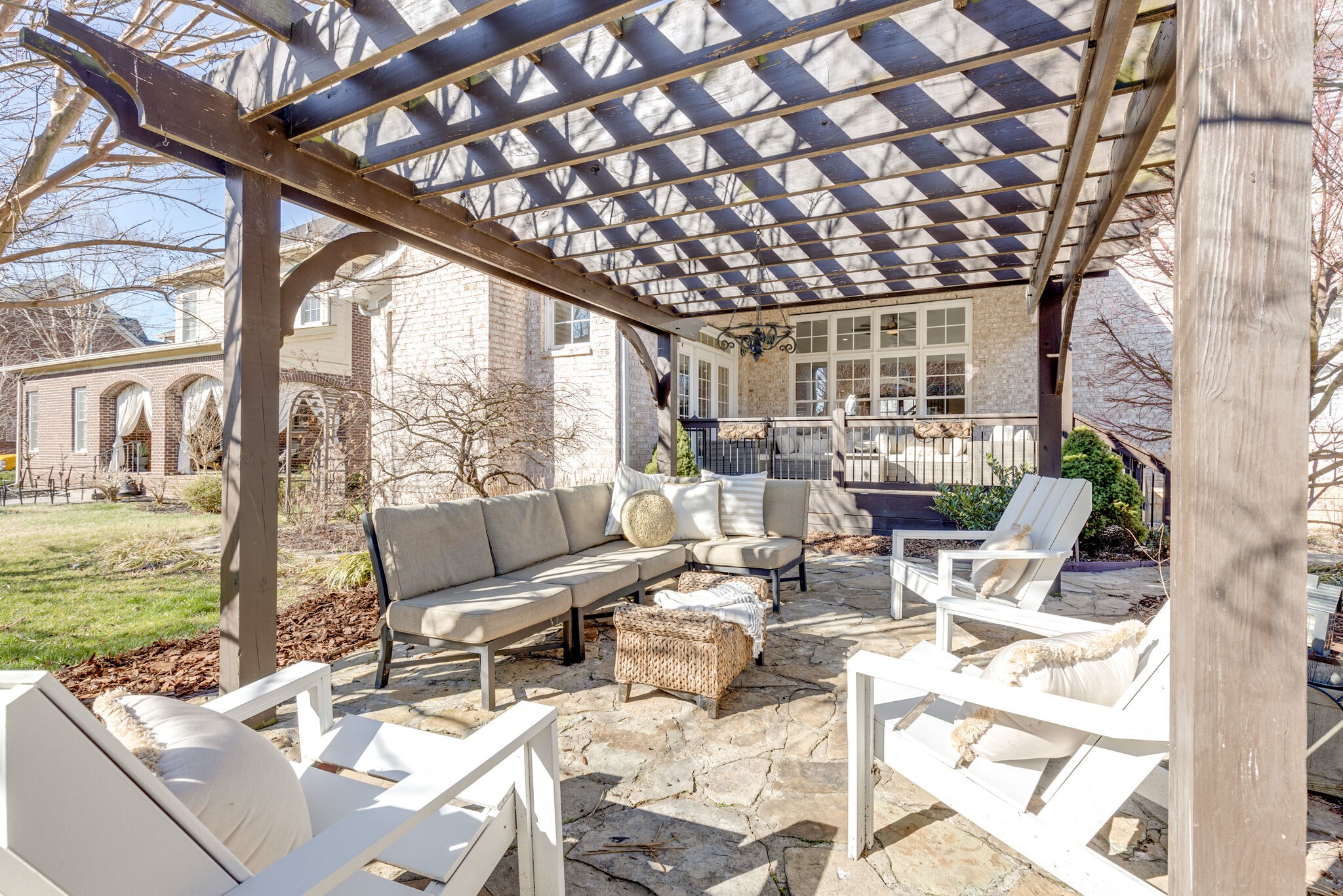 3207 Appian Way Spring Hill, TN 37174 - Photo 49 of 50 a view of a patio with couches chairs and wooden floor