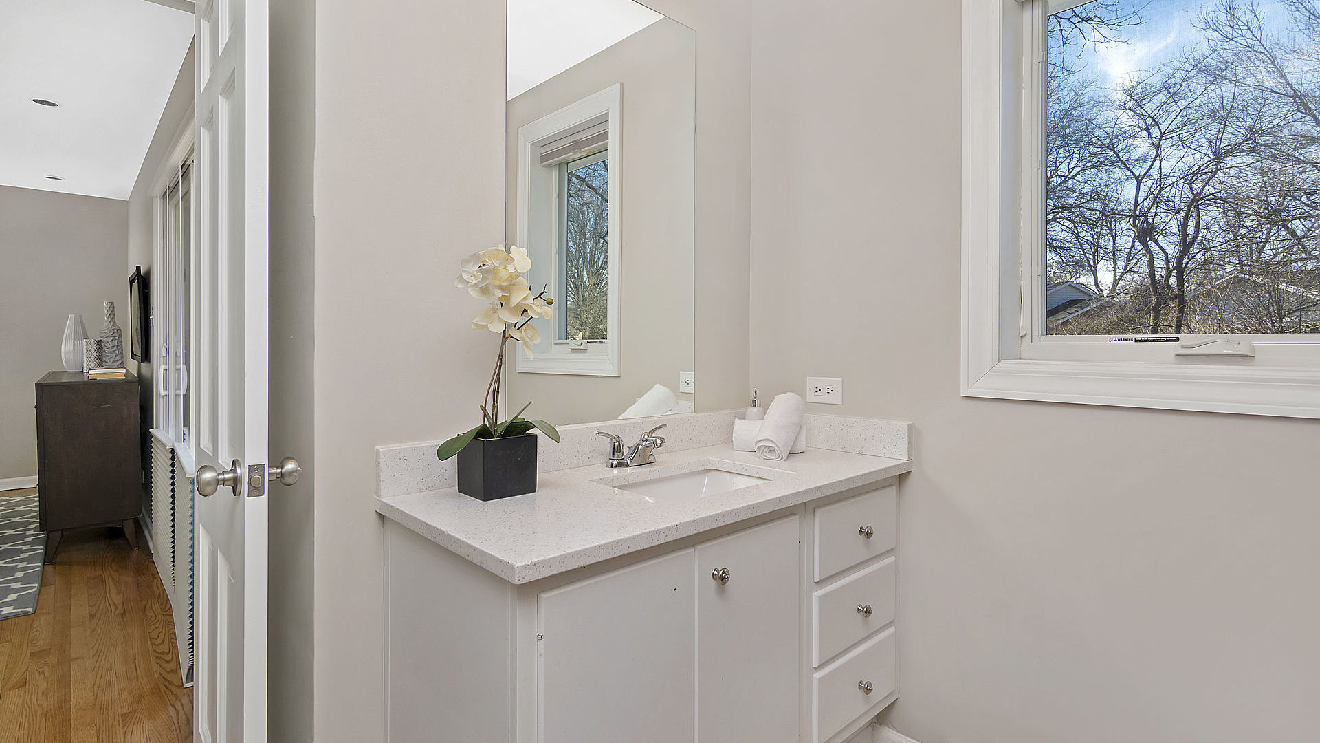 352 Gatesby Road Riverside, IL 60546 - Photo 12 of 18 a bathroom with a sink and a mirror