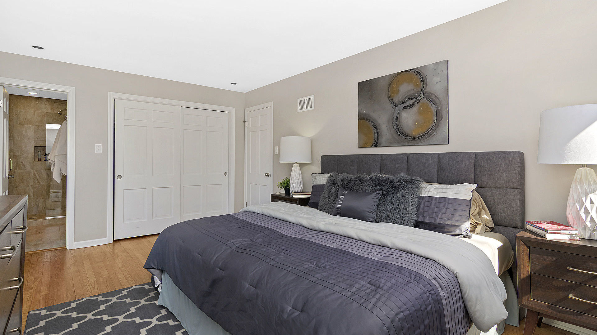 352 Gatesby Road Riverside, IL 60546 - Photo 10 of 18 a bedroom with a bed and painting on the wall